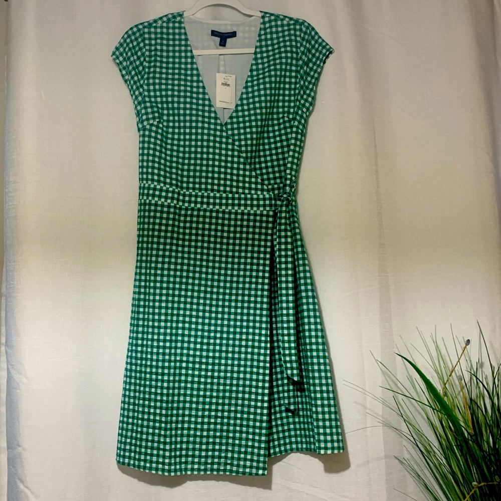 Banana Republic gorgeous faux wrap dress, brand new with tags and extra buttons.